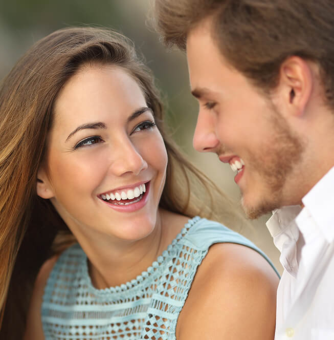 woman and man smiling